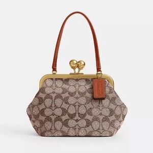 Coach Crystal Kiss lock 16